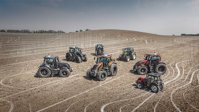 Valtra tractors on field